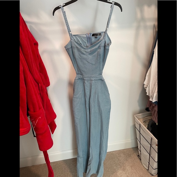 Denim jumpsuit with back cut out